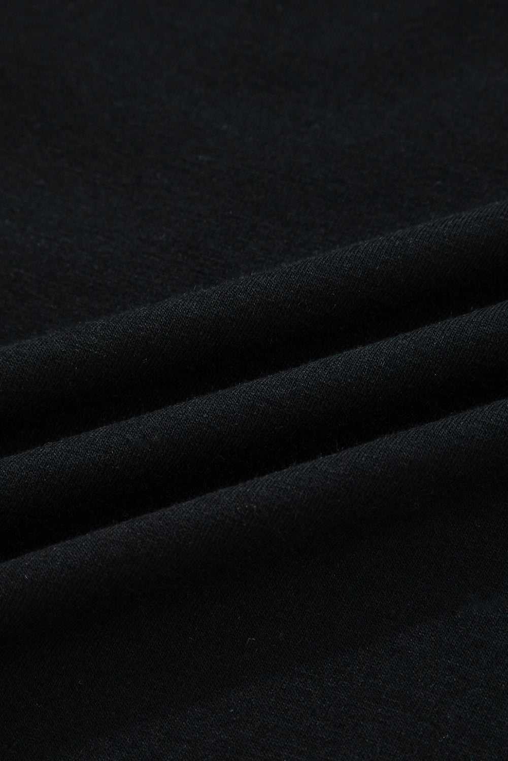 Fabric texture close-up of the Lace Sleeve Drop T-Shirt - Soft & Comfy | FashionFitz, showing the soft and comfy black material.