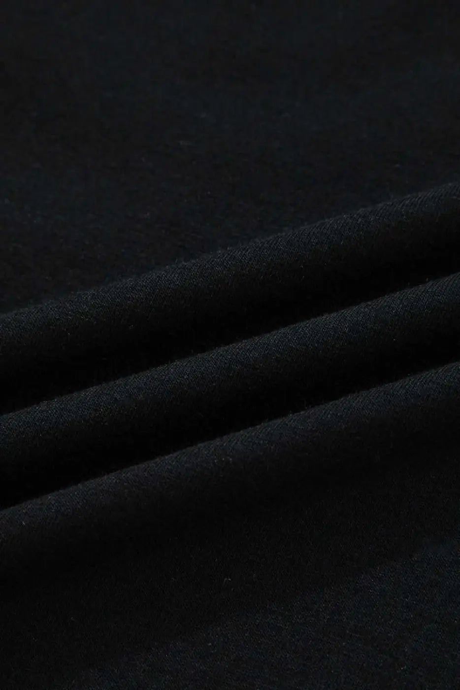 Fabric texture close-up of the Lace Sleeve Drop T-Shirt - Soft & Comfy | FashionFitz, showing the soft and comfy black material.