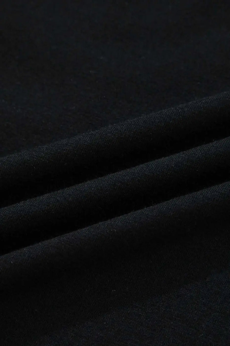 Fabric texture close-up of the Lace Sleeve Drop T-Shirt - Soft & Comfy | FashionFitz, showing the soft and comfy black material.