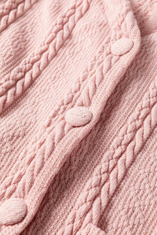 Close-up of the Blush Pink Cable Knit Co‑Ord buttons and textured cable knit fabric, emphasizing the quality and detail of the knitwear.