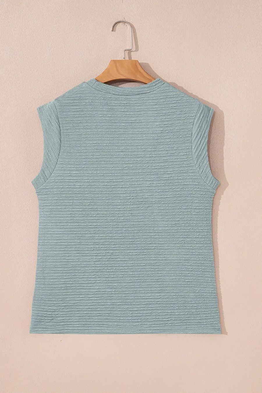 Solid crew neck tank layered under blazer — smart casual summer look