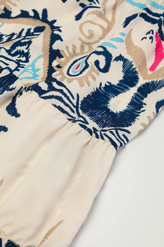 Gathered seam detail on the Tribal Mini Dress, highlighting the tiered A-line silhouette and boho pattern.