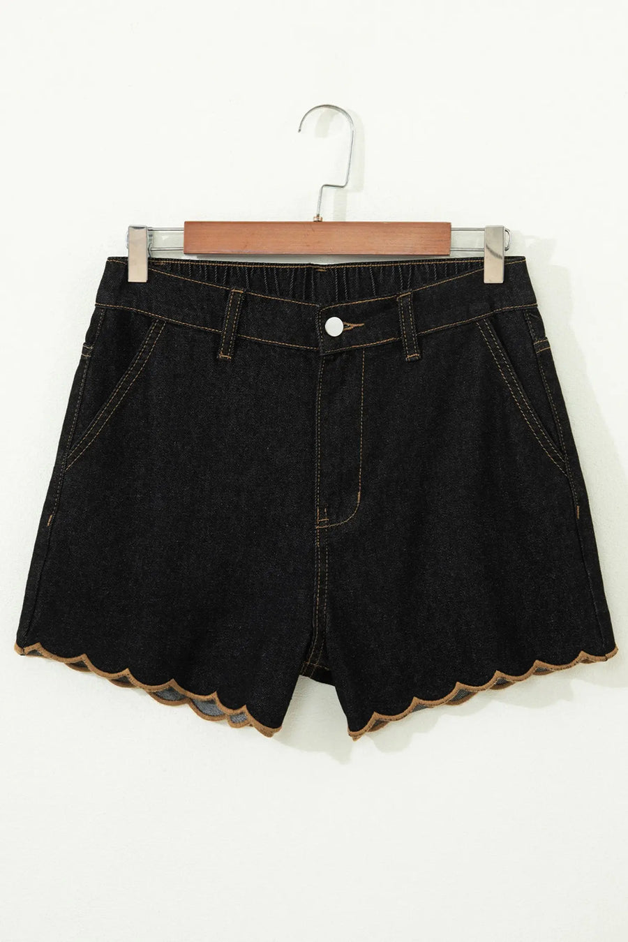 Flat lay of navy blue embroidered scalloped denim shorts showing full length and hem detail Fashionfitz UK