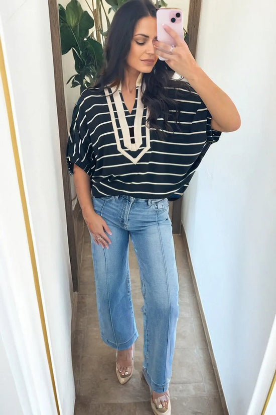 Side view of black stripe dolman top showing relaxed dolman sleeve silhouette Fashionfitz UK