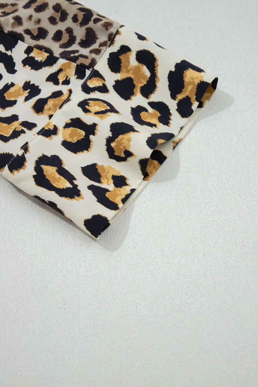 Back view of Leopard Panel 3/4 Sleeve Relaxed Shirt showing three-quarter sleeves and shirred bodice — Fashionfitz