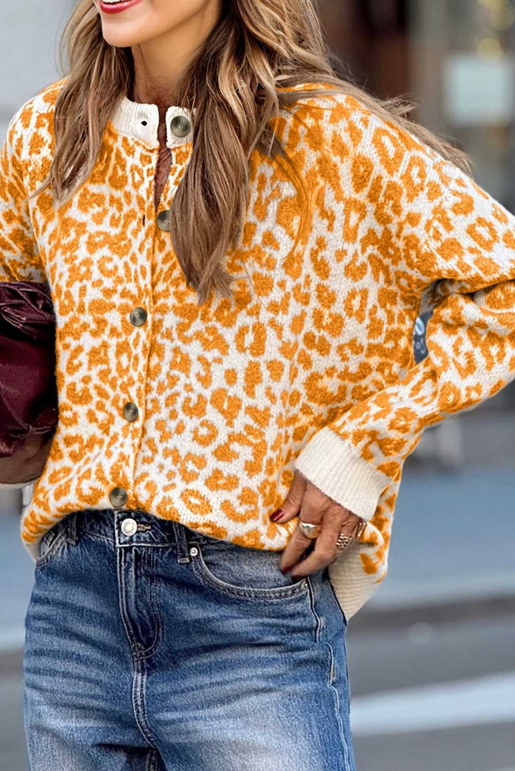 Oversized orange leopard cardigan with chunky knit texture