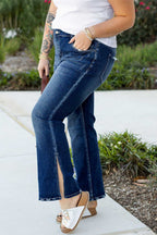 Side view of Dirty Blue Side‑Slit Flare Jeans – Curve featuring bold side slit and flare silhouette in durable plus size denim.