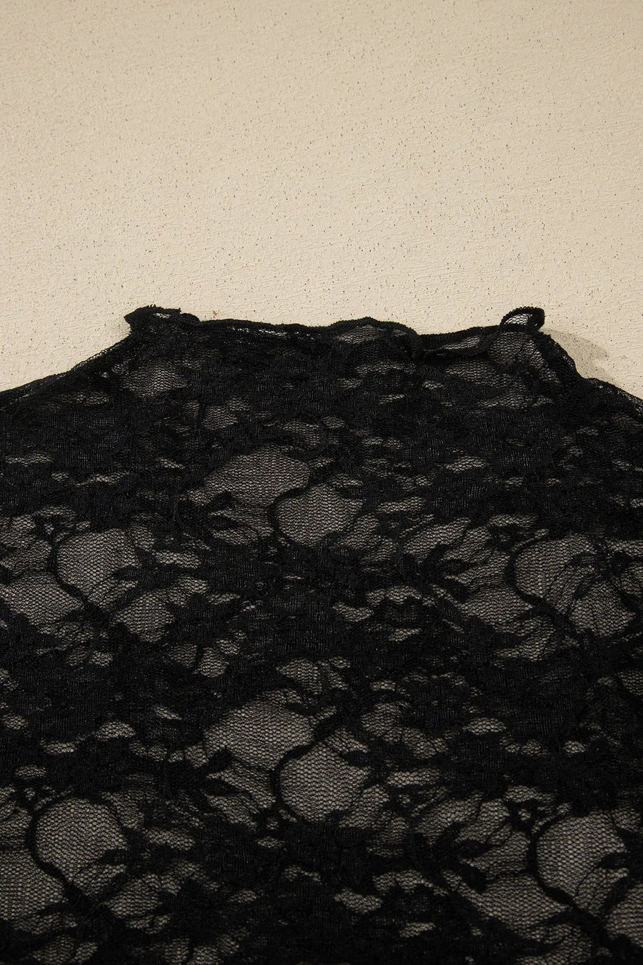 Women's black lace lettuce trim top model shot casual