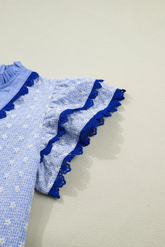 Eyelet embroidered flutter sleeve blouse with lace trim blouses