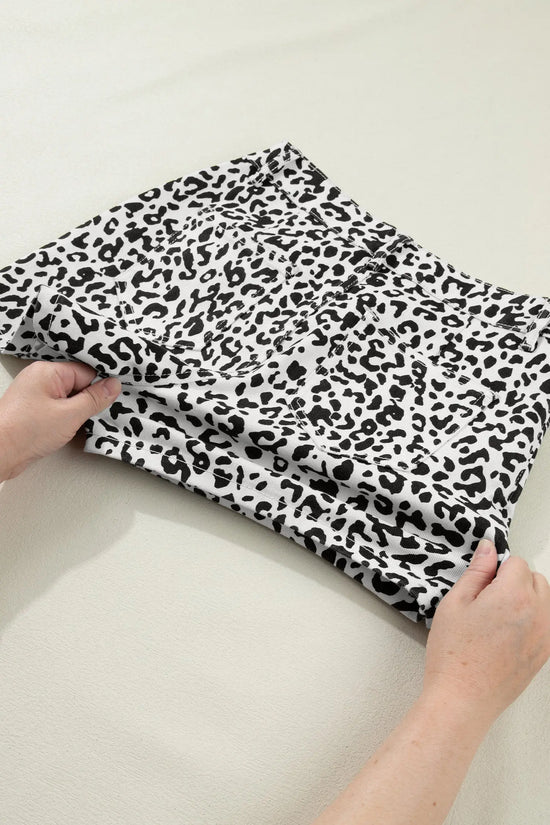 Black leopard print button overlap denim shorts