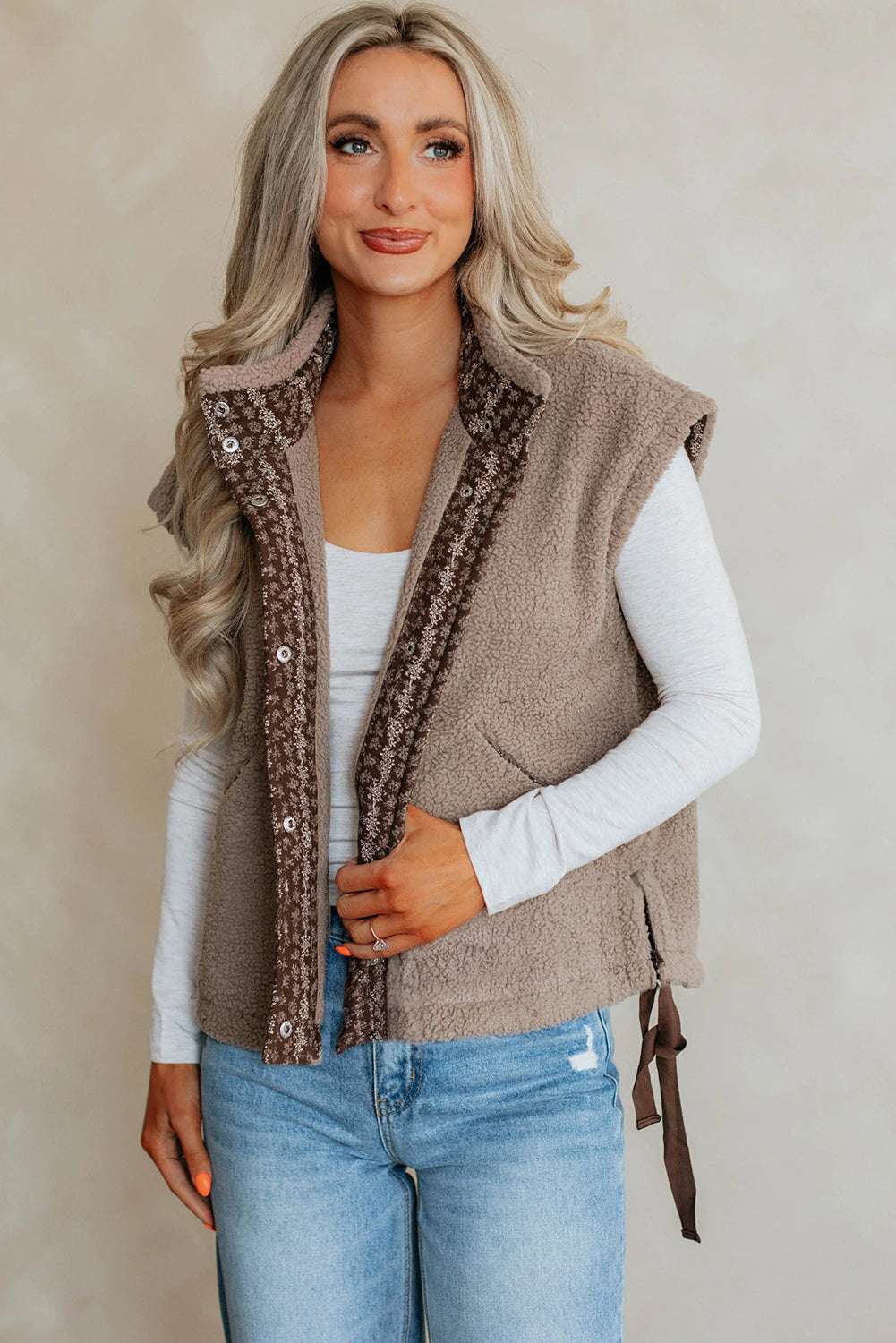 Front view of Women's Country Borg Fleece Gilet Winter Vest FashionFitz with cozy fleece texture, floral trim, and snap-button closure.