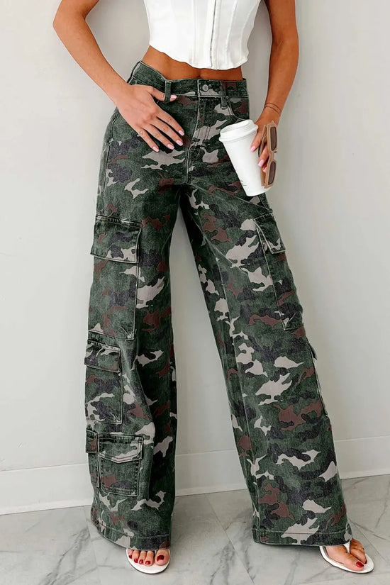 Camo cargo jeans for women with wide leg fit and utility pockets in green camo print. High-waisted denim pants ideal for casual wear.