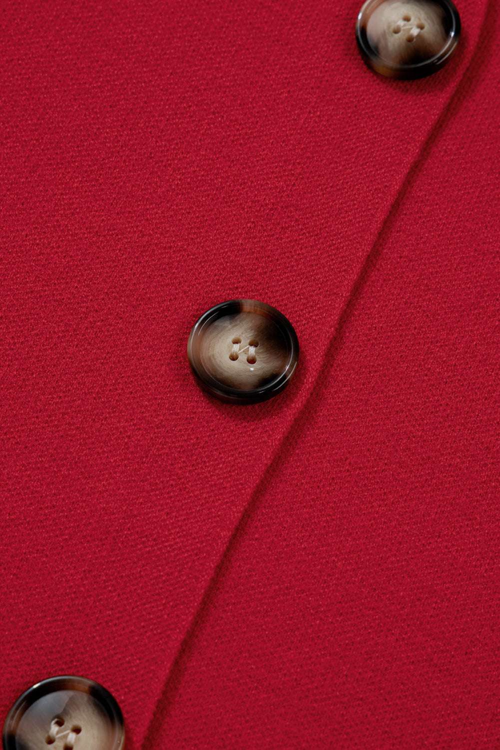 Detailed close-up of tortoiseshell buttons on the Women's Red Collared Wrap Cardigan Jacket, emphasizing stylish accents.