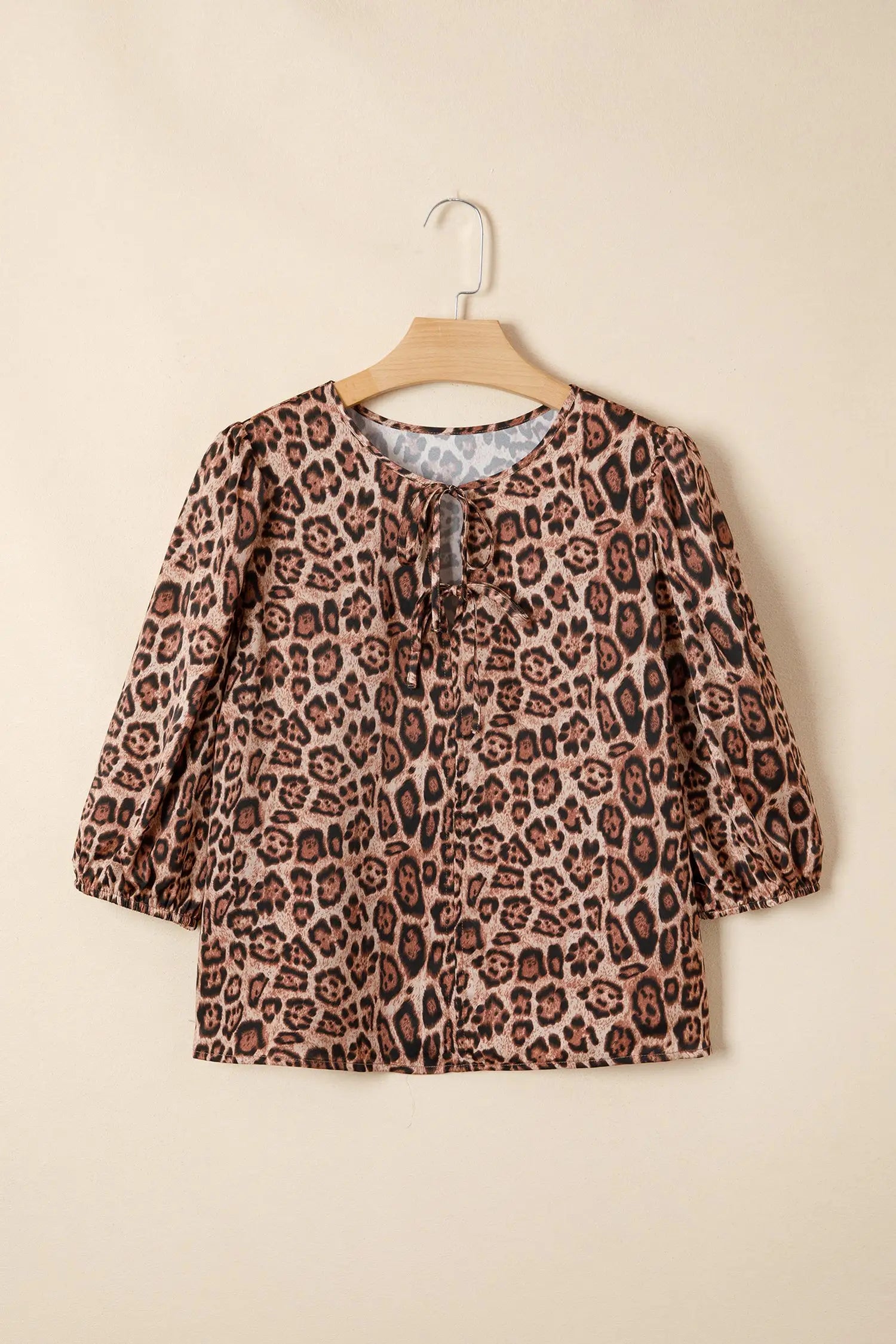 Back view of brown leopard bow tie blouse showing puff sleeve gathering and fabric print Fashionfitz UK