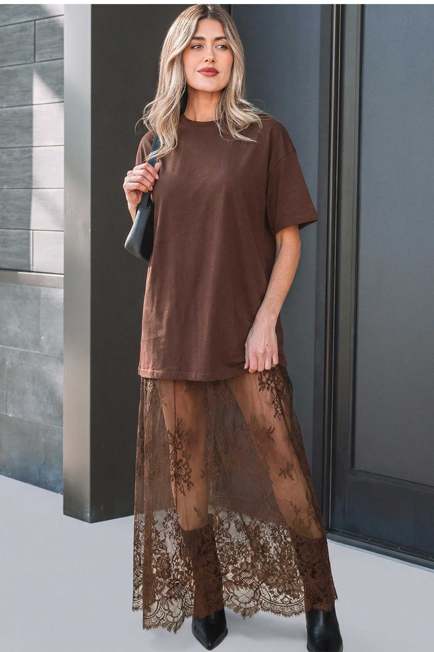 Brown Floral Lace Skirt Maxi Dress with sheer floral lace hem and oversized top, styled with black boots for a chic summer outfit.
