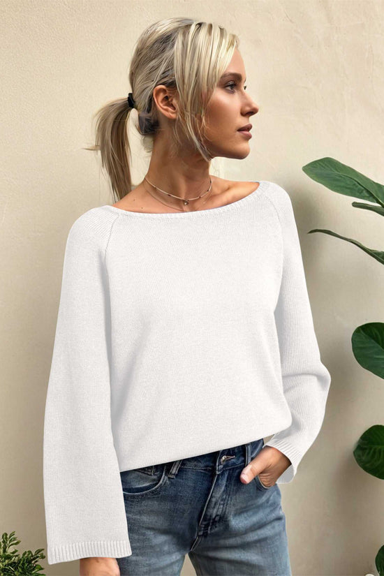 Relaxed fit white Bell Sleeve Loose Knit Jumper paired with denim, showcasing soft knitwear for casual layering.