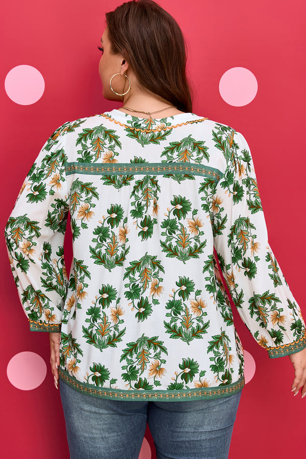 Back view of floral patchwork plus size blouse with tassel tie