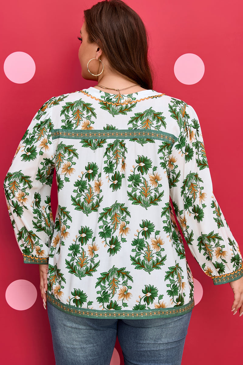 Back view of floral patchwork plus size blouse with tassel tie