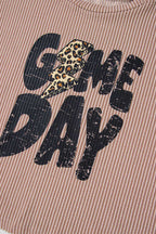 Text 'GAME DAY' with a leopard print heart on a textured background
