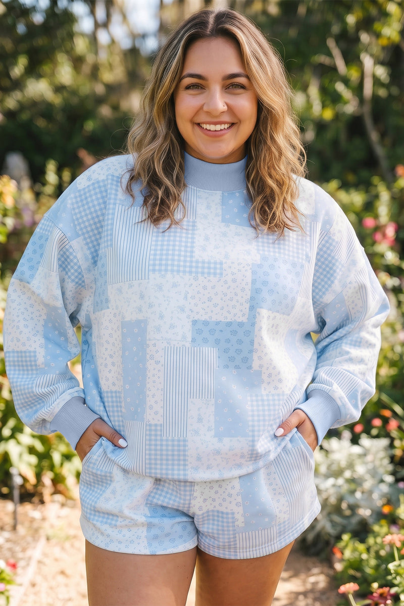 Sky blue floral patchwork plus size set — side view showing stand neck and long sleeve
