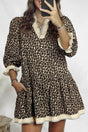 Leopard Print Striped Trim Mini Dress with puff sleeves and ruffled V-neckline, styled for a casual summer look in A-line silhouette.