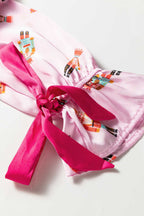 Bow and trim detail on festive satin pyjama top