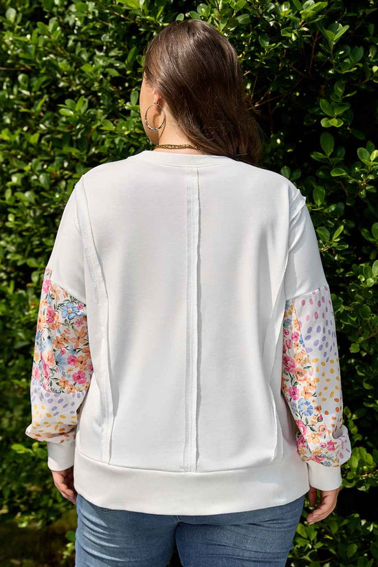 Back view of plus size floral sleeve sweatshirt showing seam detail and vibrant multicolor patchwork sleeves. Ideal for autumn daily wear.