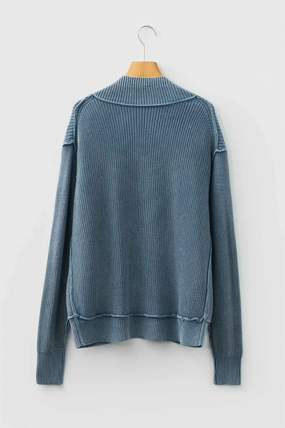 Back view of blue Women's Stonewash Patchwork Knit Open Cardigan, showing long sleeves and ribbed knit structure.