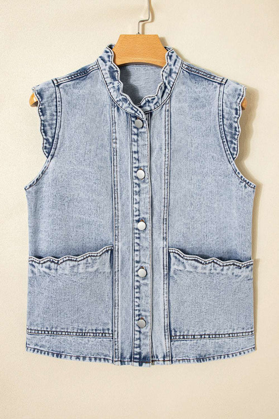 Flat lay of Beau Blue Scallop‑Trim Denim Waistcoat on hanger, featuring scallop trim collar and front flap pockets in soft denim.