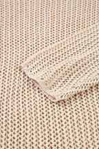 Close-up of beige textured fabric with a folded corner