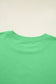Back neckline detail of green Drop Crop Wide-Leg Pants Set, showcasing soft ribbed collar for added comfort.