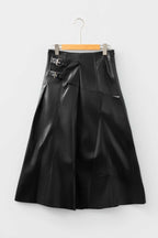 Black Faux Leather Pleated Flared Skirt | FashionFitz product-only front view on hanger, showing structured pleats and dual buckle waist detail.