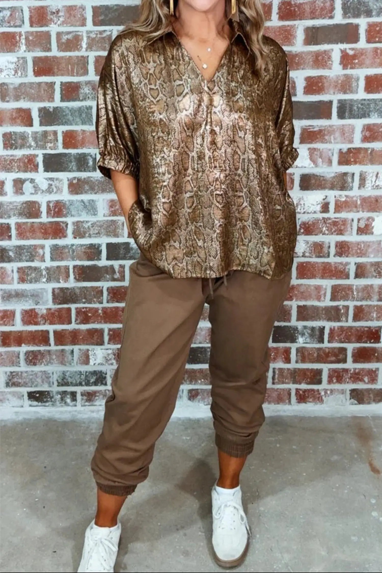 Polo collar V-neck close-up on brown metallic leopard print blouse | Fashionfitz
