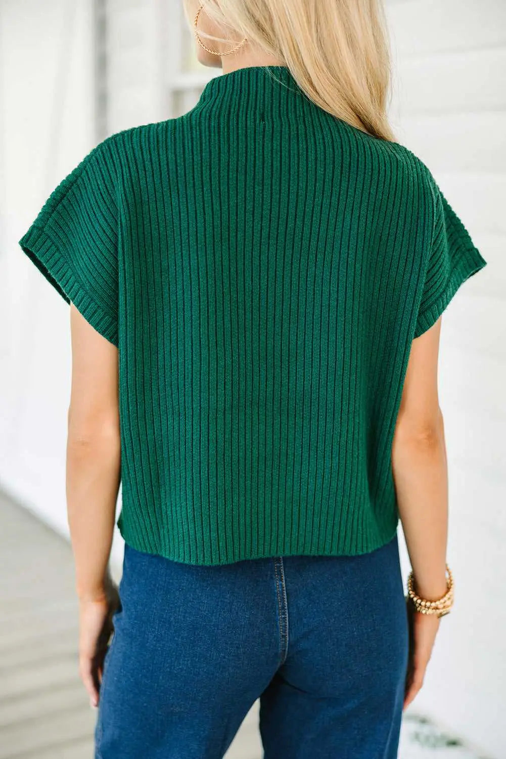 Back view of green Ribbed Knit Short Sleeve Sweater showing ribbed texture and relaxed fit, ideal for fall layering.