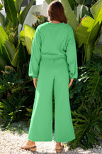 Back view of green Drop Crop Wide-Leg Pants Set showing wide-leg cut and elastic waistband, ideal for comfortable loungewear styling.