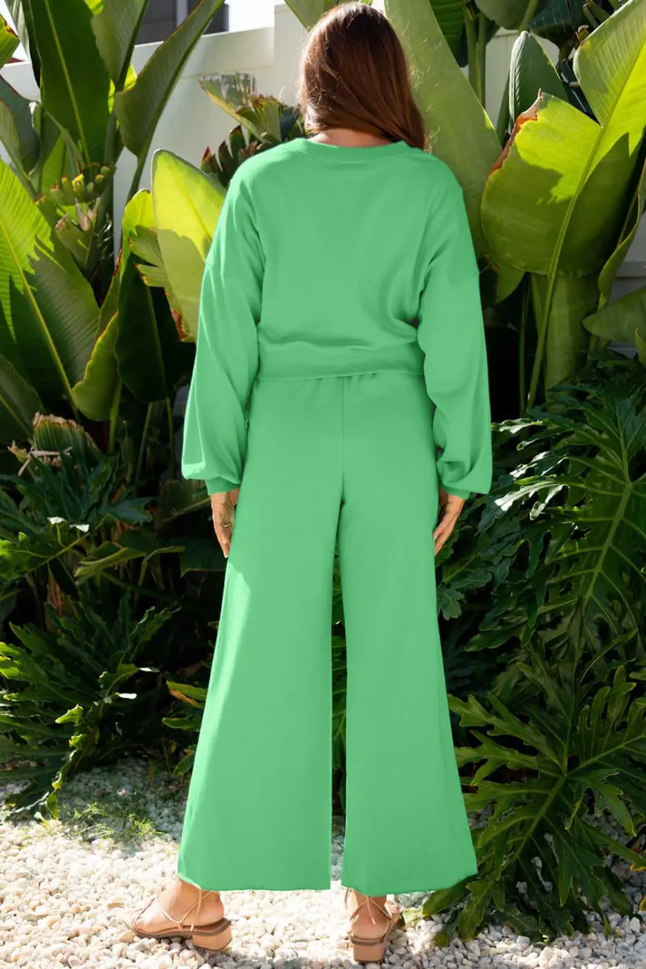 Back view of green Drop Crop Wide-Leg Pants Set showing wide-leg cut and elastic waistband, ideal for comfortable loungewear styling.