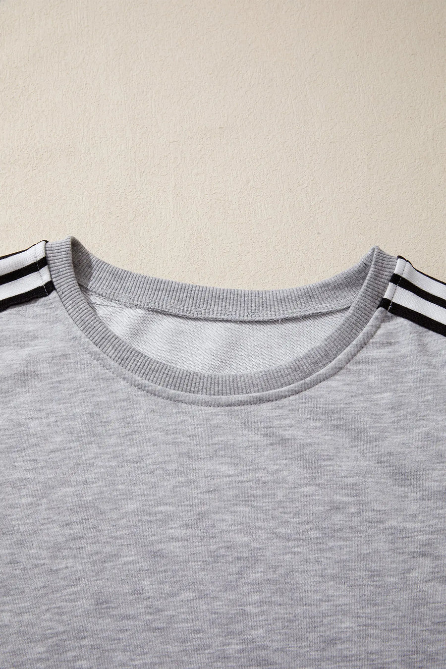 Patchwork Stripe Raw Edge Hem Oversized Short Sleeve Round Neck Tee — angled view | Fashionfitz UK
