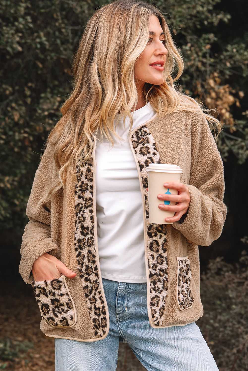 Casual autumn look featuring women’s plush leopard print jacket with sherpa fleece and front button closure, styled with jeans.