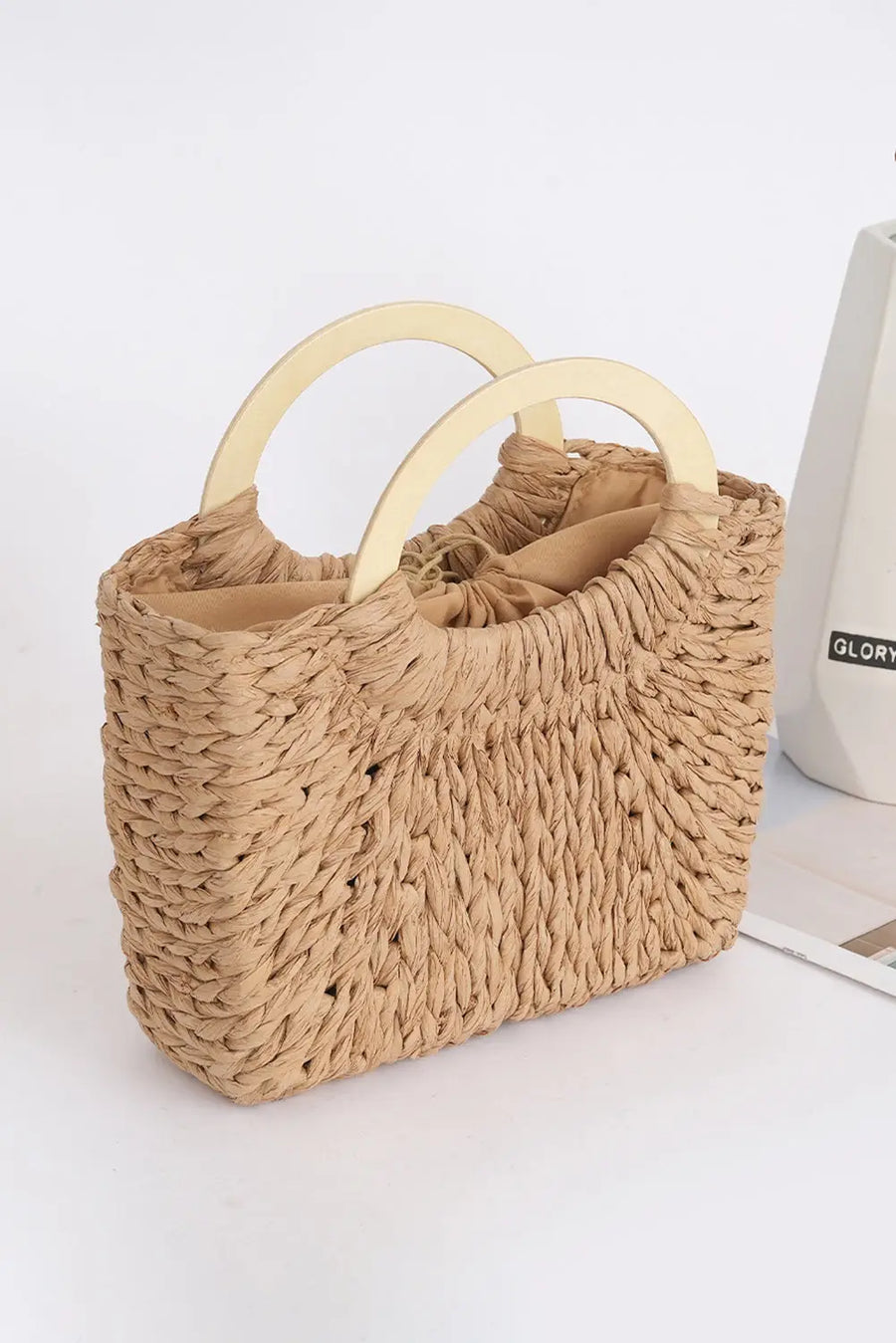 Women's straw handle bag lifestyle shot casual summer