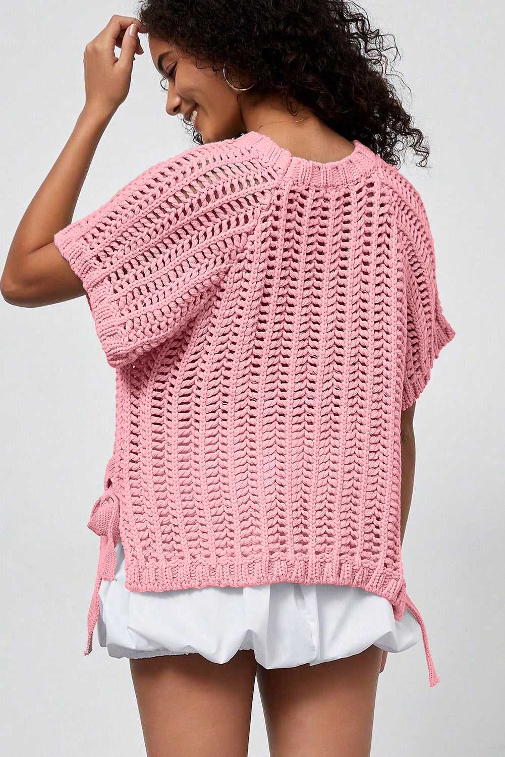 Back view of pink Plus Size Bow Tie Open‑Knit Jumper for Women showing breathable knit and curve-friendly fit.