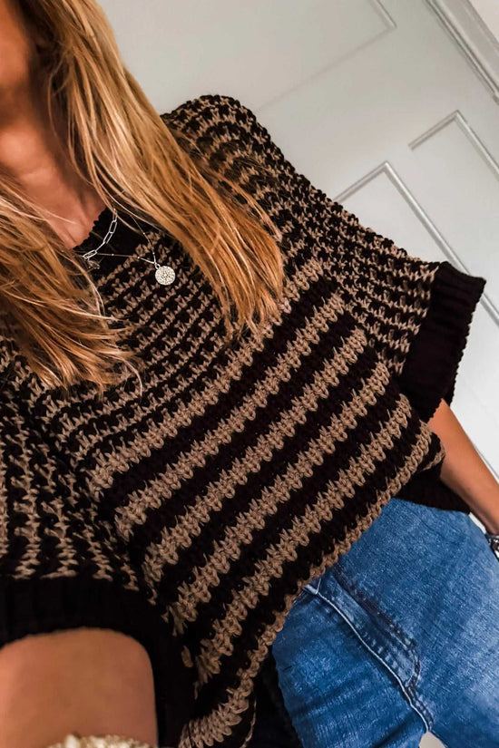 Close-up of black striped Soft‑Knit Slouchy Jumper for Women showing soft knit texture and short sleeve design.