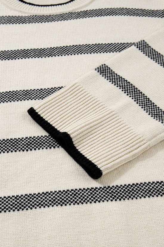 Detailed view of bell sleeve on Women's Apricot Striped Bell Sleeve Jumper, showing ribbed cuff and stripe pattern. Cozy and fashionable knitwear.