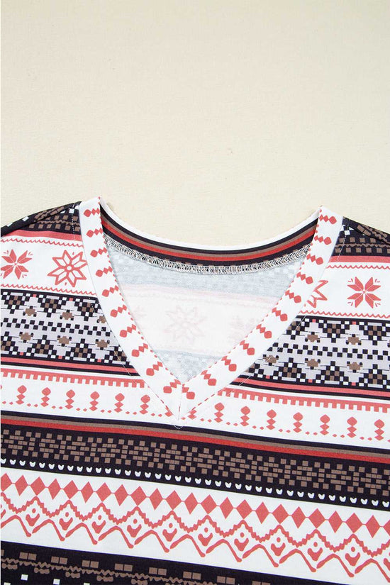 Close-up of V-neck collar on Women's Christmas Comfort Lounge Set in Black by FashionFitz, highlighting detailed stitching and festive design.