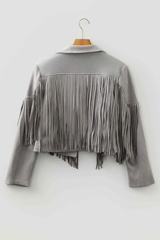 Back view of gray cropped fringe faux suede jacket on hanger, showcasing full-length fringe and structured shoulder design.