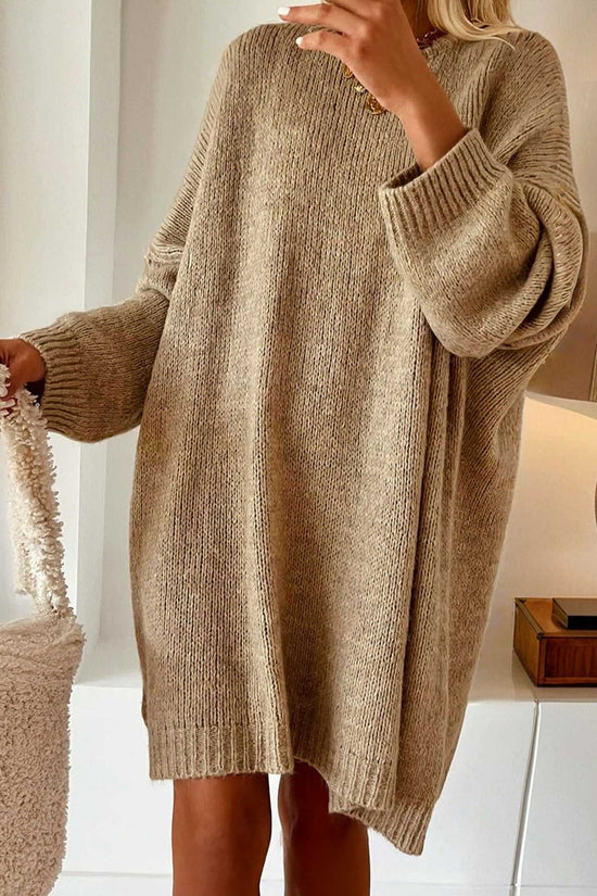 Person wearing a Khaki Oversized Jumper Dress in a minimal indoor setting