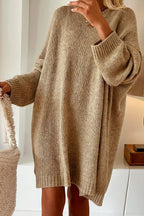 Person wearing a Khaki Oversized Jumper Dress in a minimal indoor setting