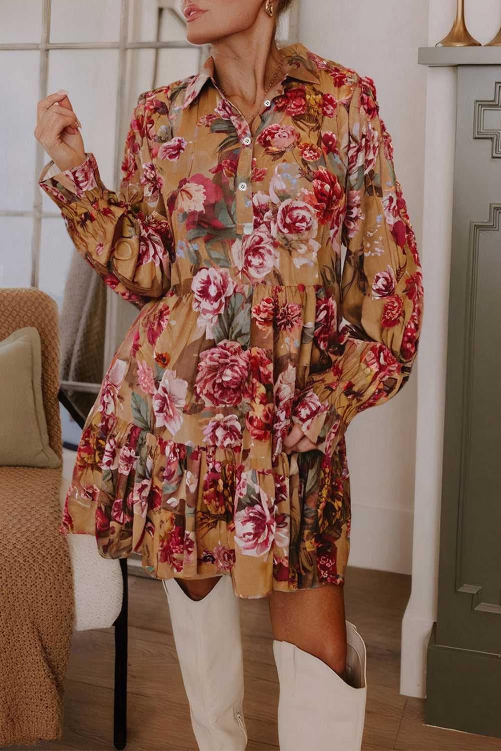 Retro Floral Ruffle Mini Dress in brown with long sleeves and red floral print, styled for fall partywear with white boots.