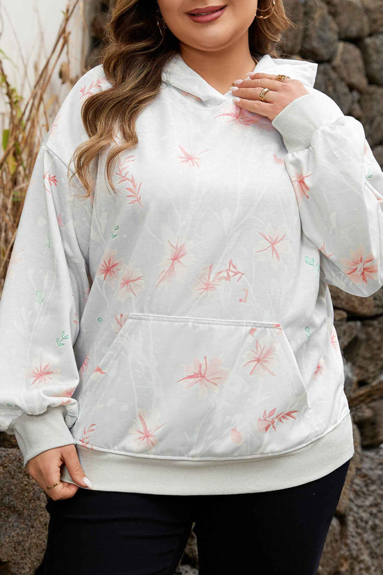 Close-up of Curve Floral Print Hoodie highlighting soft fabric, pink floral pattern, and front pocket for cozy plus size comfort.