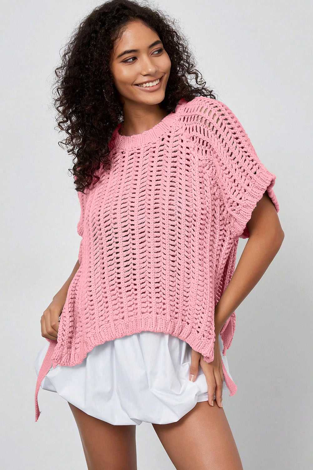 Front angled view of pink Plus Size Bow Tie Open‑Knit Jumper for Women styled for summer with lightweight texture.