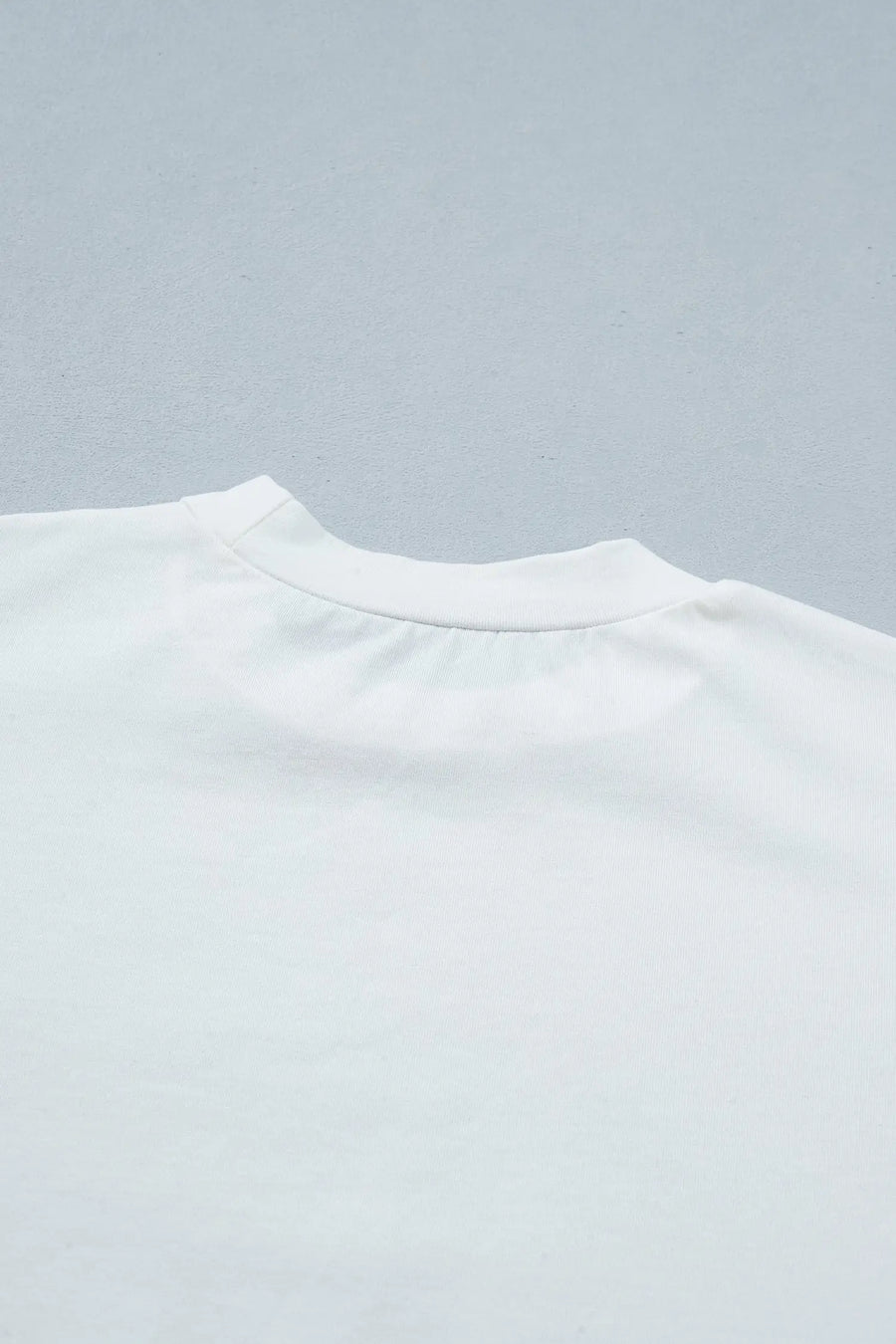 Asymmetric lace hem patchwork tee detail close-up | Fashionfitz UK
